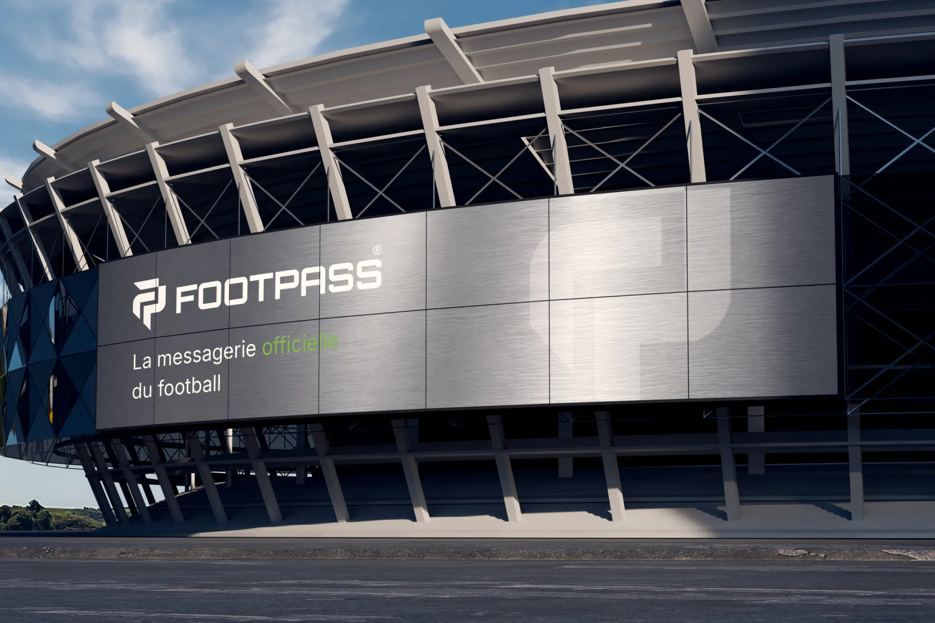 Logo Footpass sur l'écran géant d'un stade, avec la signature « La messagerie officielle du football »